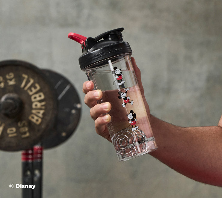 pro-series-u1 Mickey_Mouse_Protein_Shaker_Bottle_Being_Held_In_the_Gym.jpg